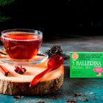 3 Ballerina cinnamon flavor herbal tea box with brewed tea cup cinnamon sticks and spices